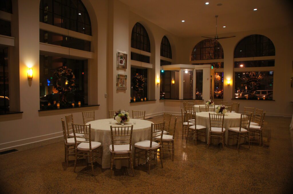 round reception tables inside Florentine building